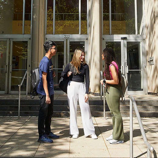 Three students talking. Links to Beneficiary Designations Three students talking. Links to Beneficiary Designations