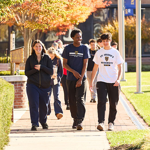 Students walking on campus. Links to Gifts of Appreciated Securities Students walking on campus. Links to Gifts of Appreciated Securities