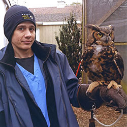 Michael Vignato holding an owl Michael Vignato holding an owl