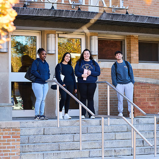 Students walking out of a building. Links to Gifts by Estate Note Students walking out of a building. Links to Gifts by Estate Note